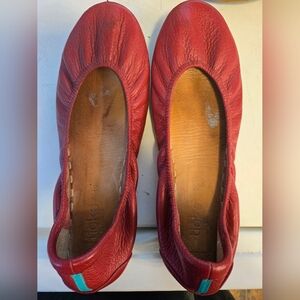 Red classic tieks, size 10